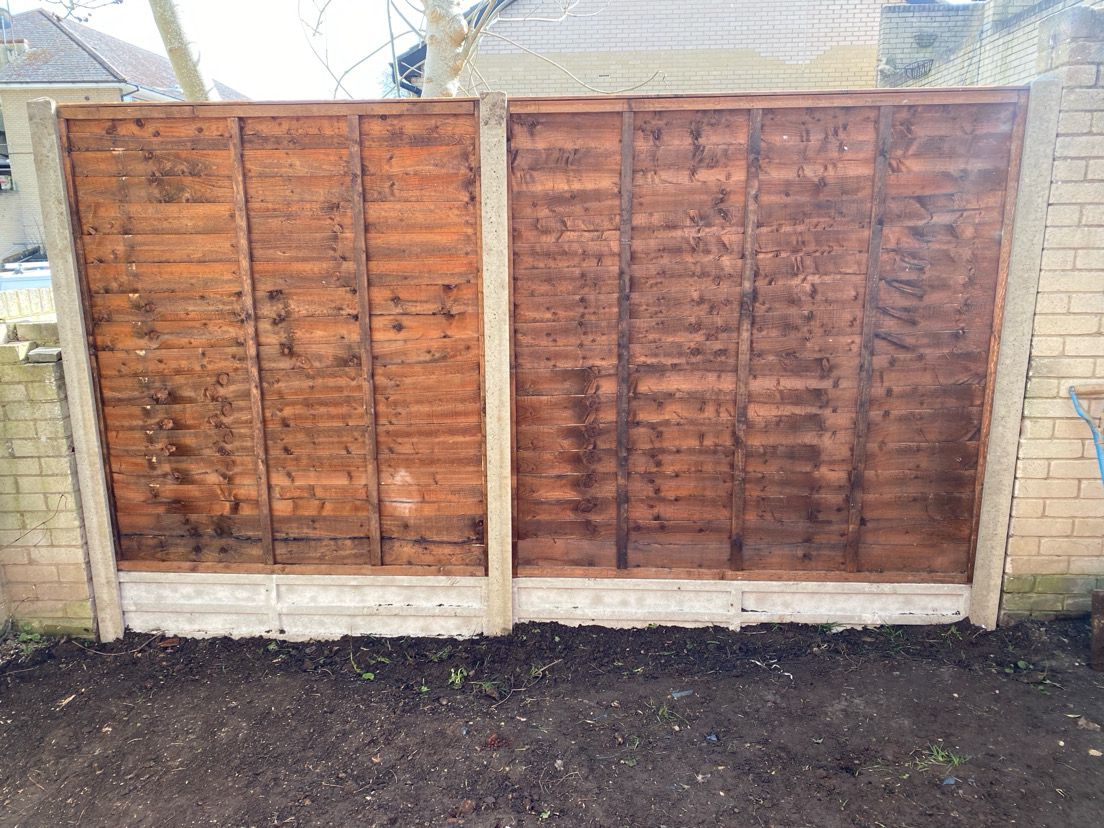 Wooden fence panels installation showing before and after